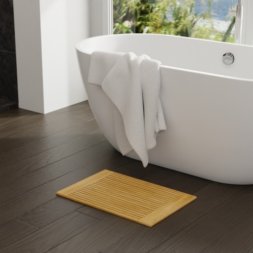 18421 PacificaÂ Bath Mat side angled view on bathroom tile floor in front of soaking tub 